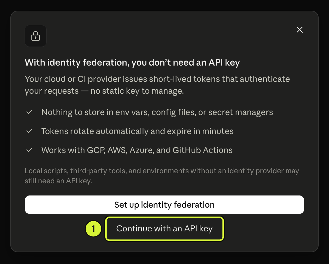 Anthropic's identity federation prompt with the Continue with an API key link marked